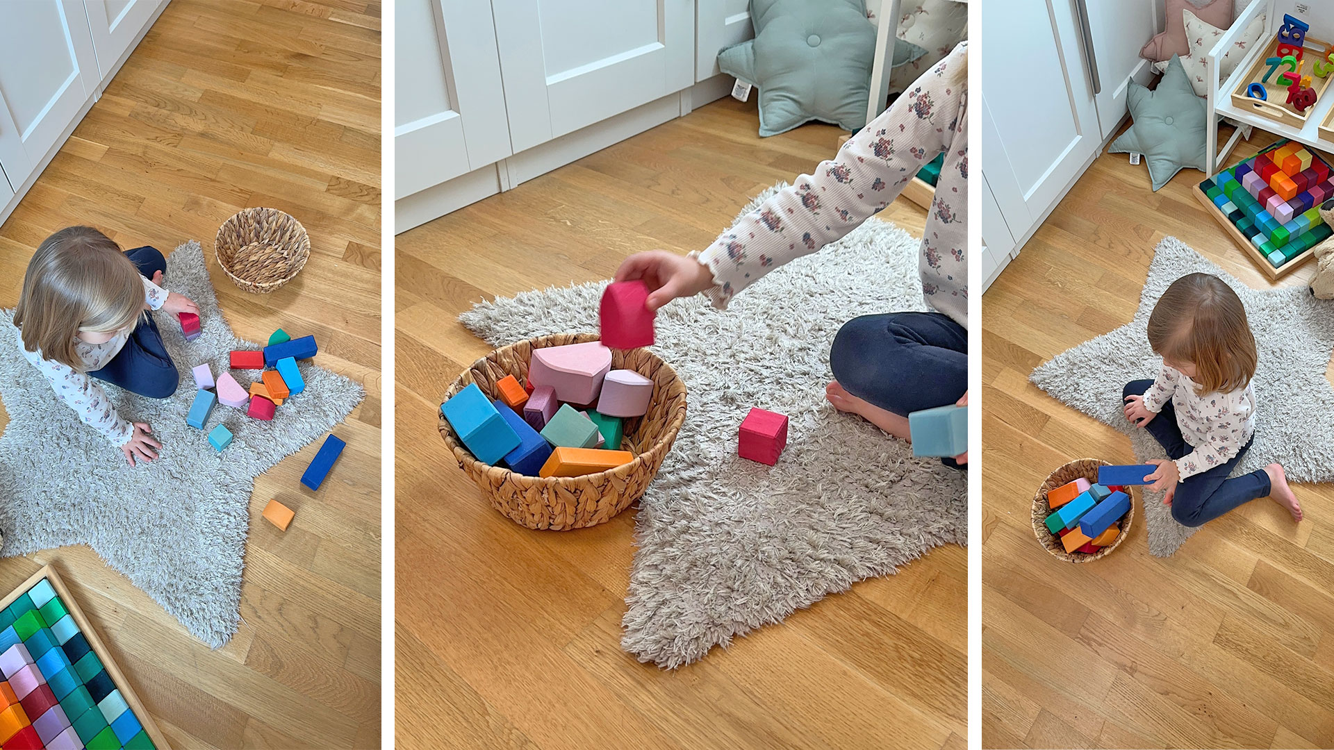 Little girl sits on the floor and puts colourful wooden building blocks into a wicker basket.